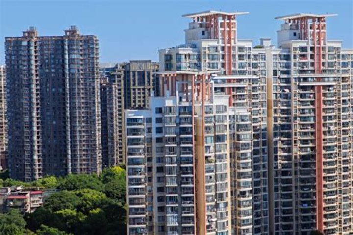 Shanghai lifts home-buying curbs to boost property sector