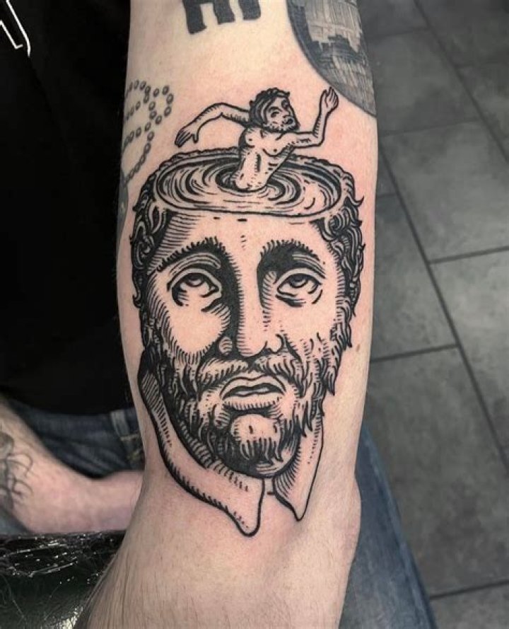 Alex Greenwood Tattoo Meaning and Design